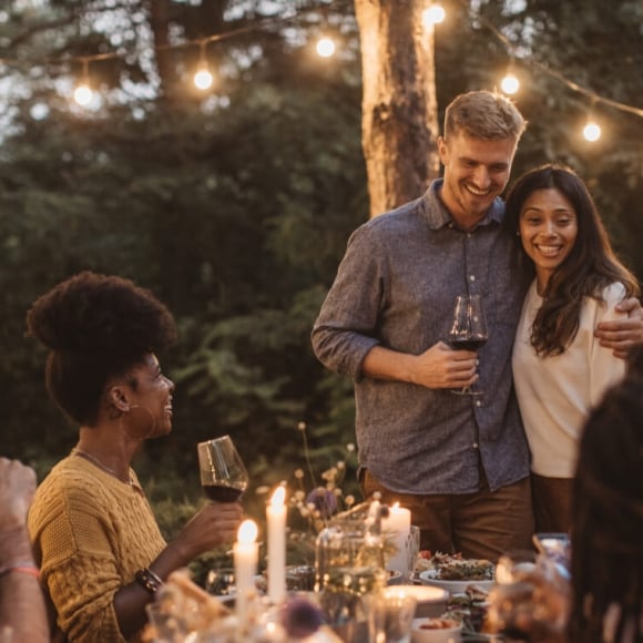 A group celebrating around a table in Vail CO