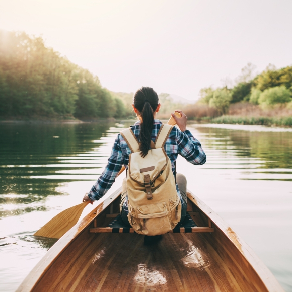 A woman canoeing in Vail CO