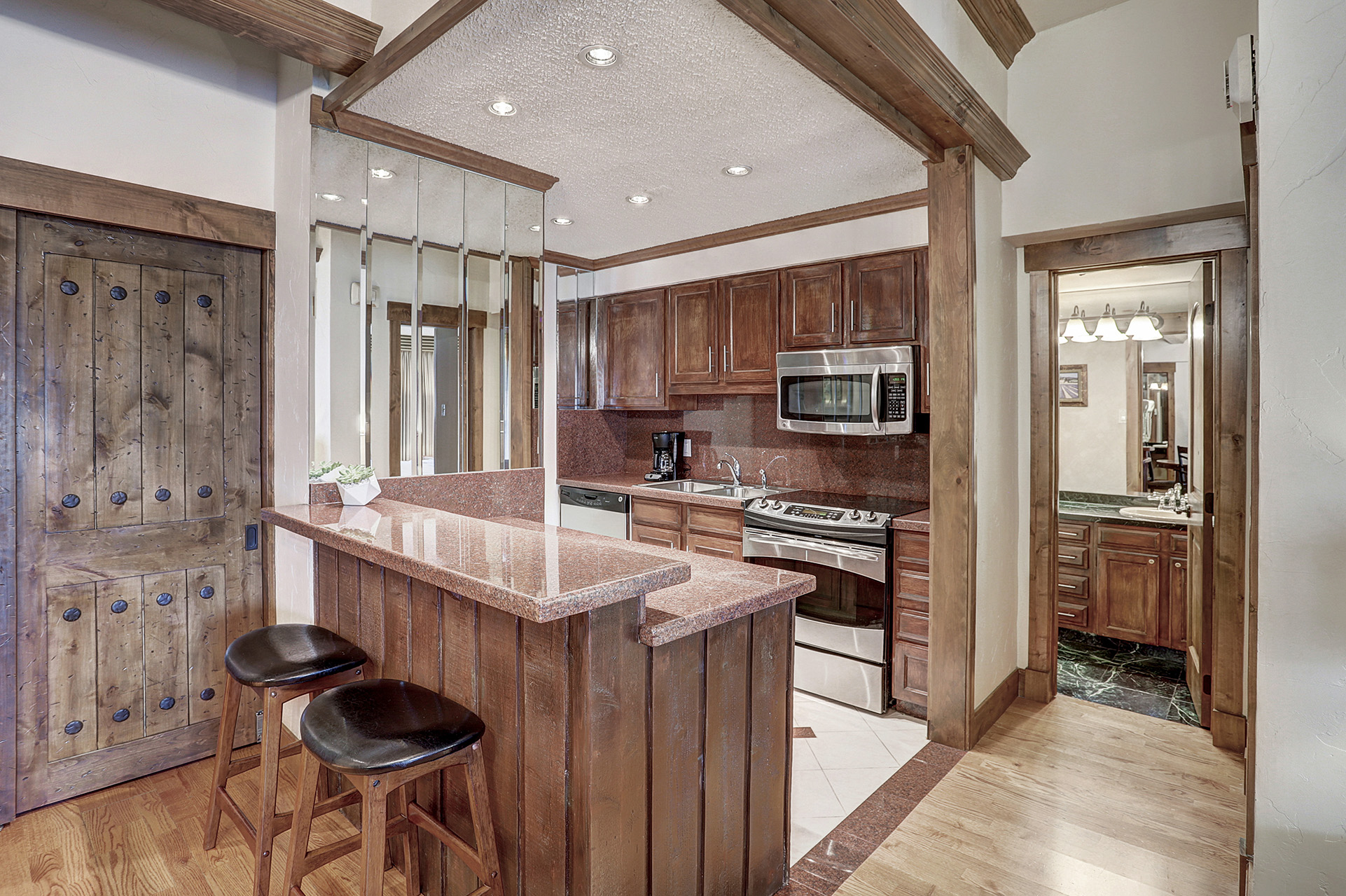 The kitchenette of a 2 bedroom suite at The Hythe Vail CO