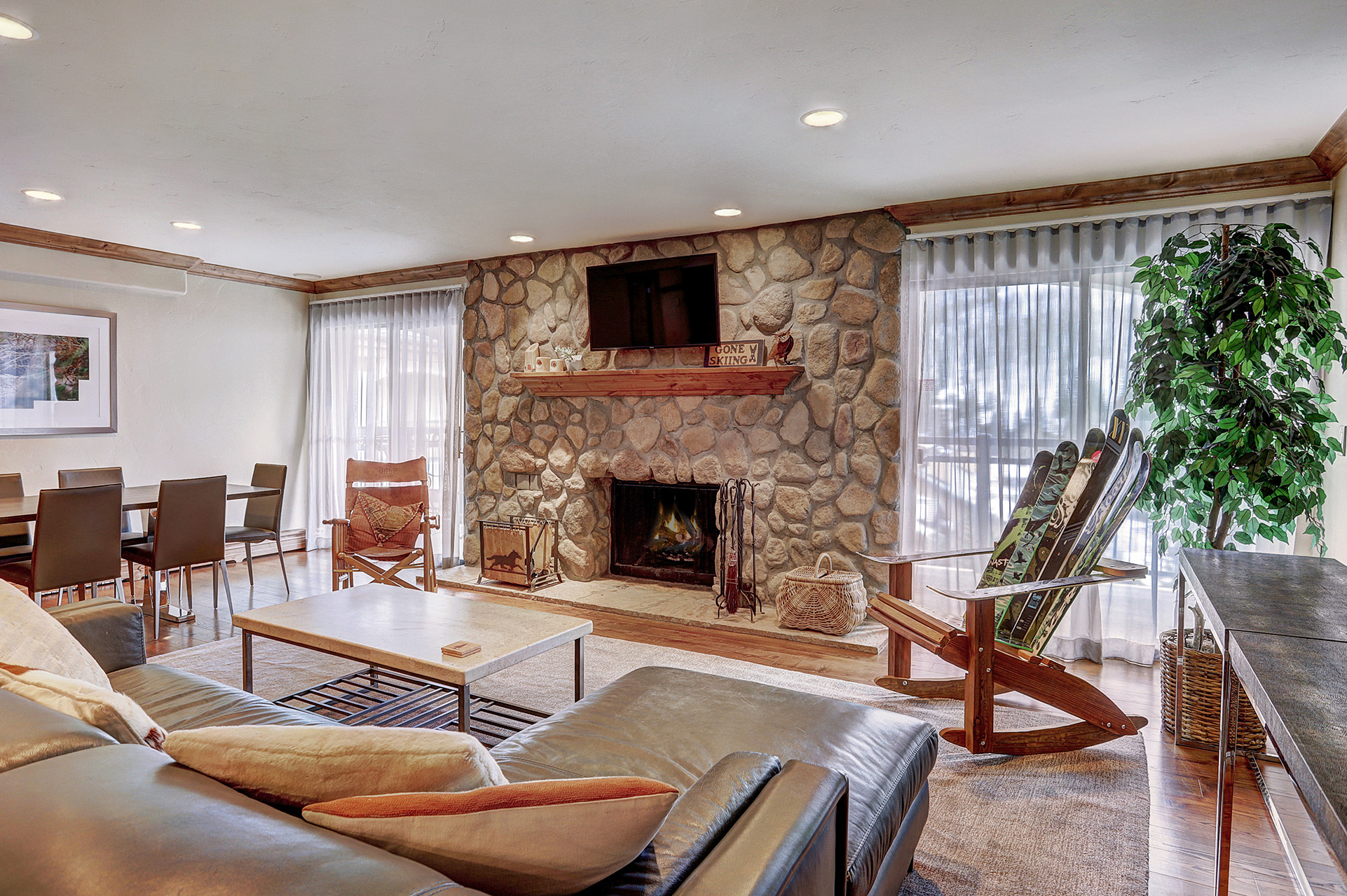 The fireplace and lounge of a 3 bedroom suite at The Hythe Vail CO