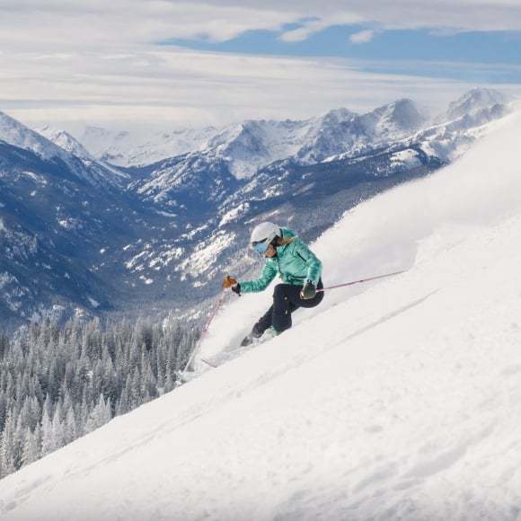 Woman Snowboarding