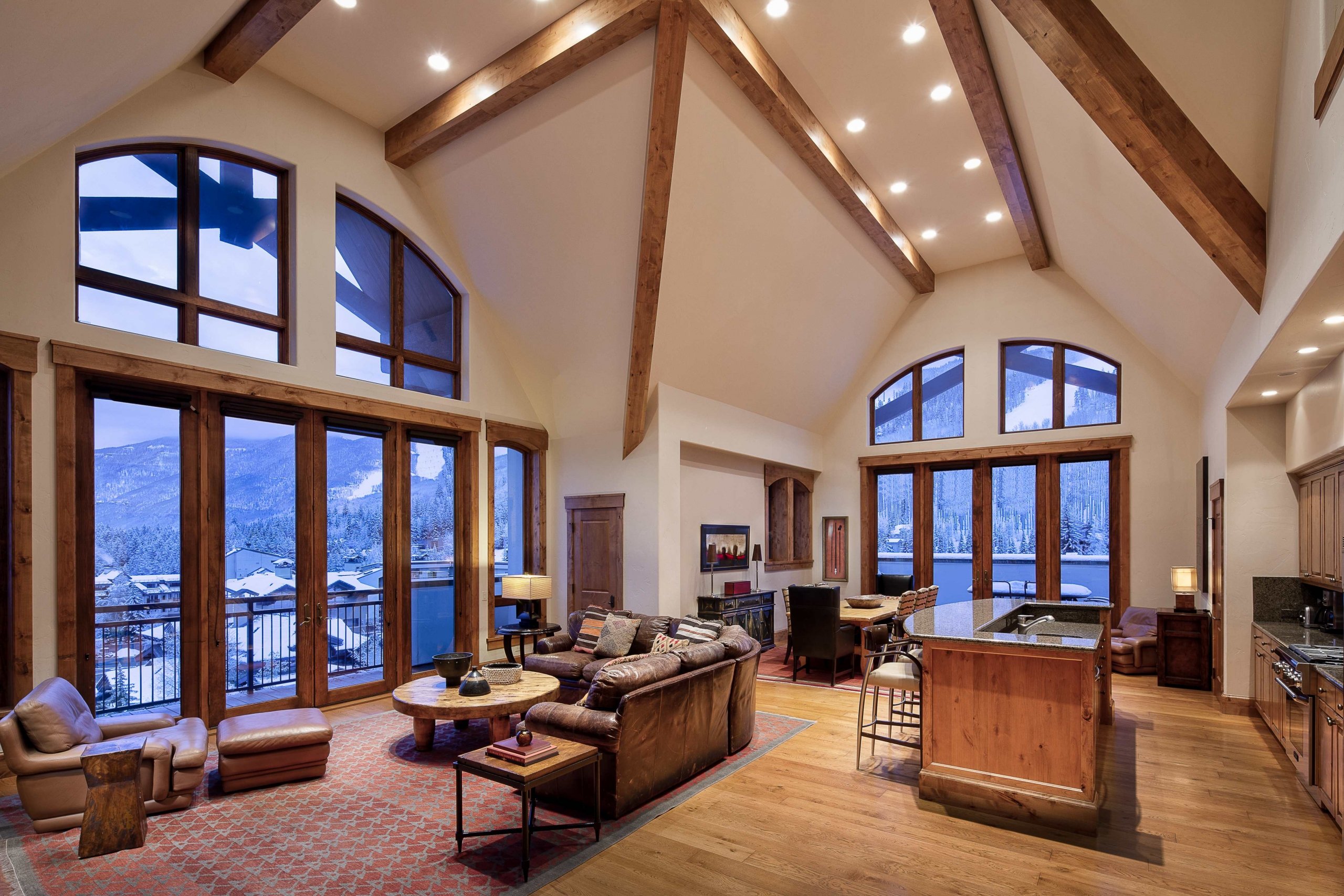 A full room view of an open concept living and dining space