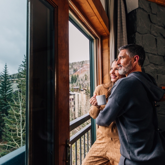 Couple looking out of the window