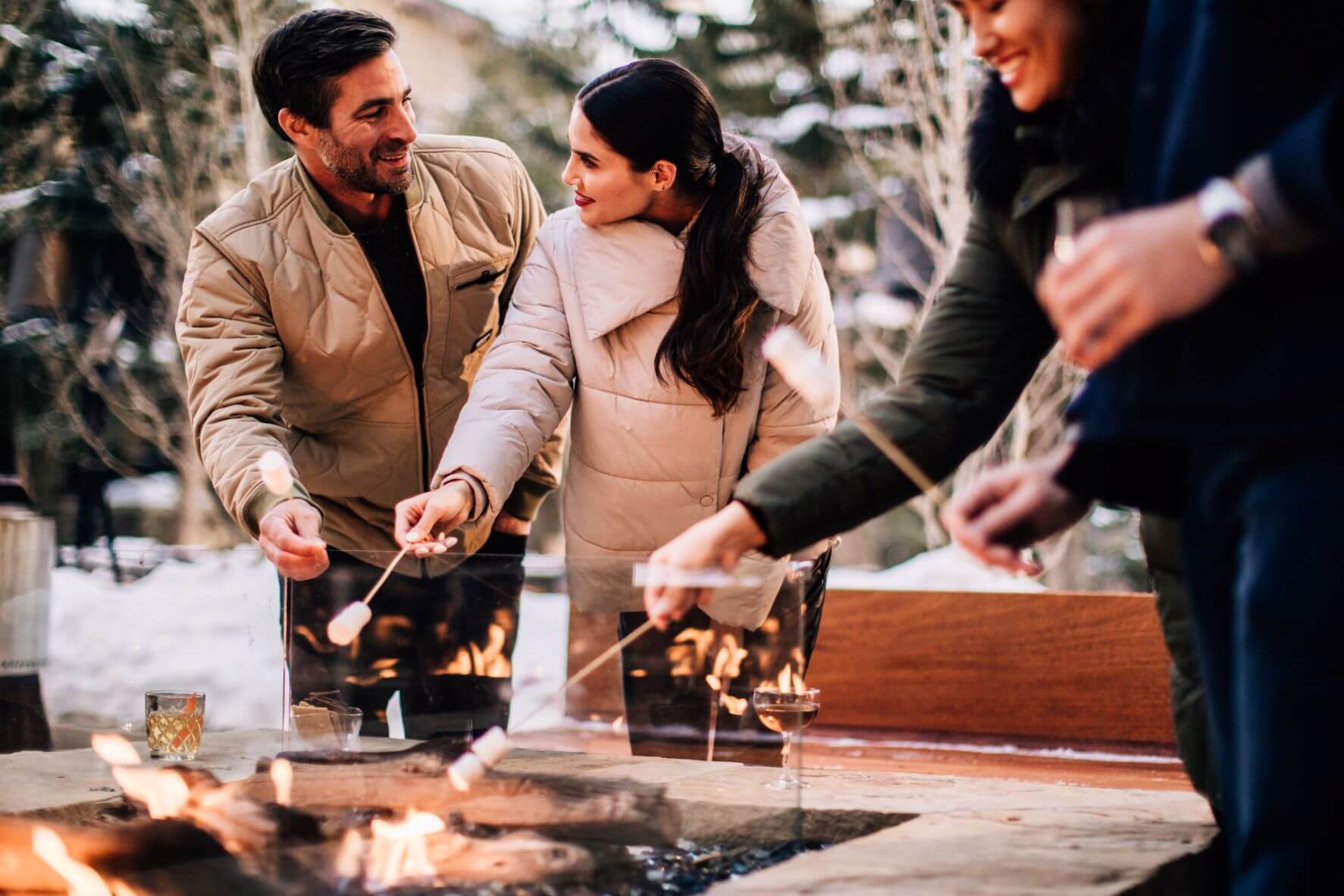 Friends Enjoying Roasted Marshmallow on Stick